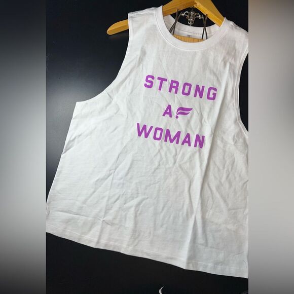 Fabletics International Women’s Day Muscle Tee Tank Size Medium NWOT - Picture 2 of 8